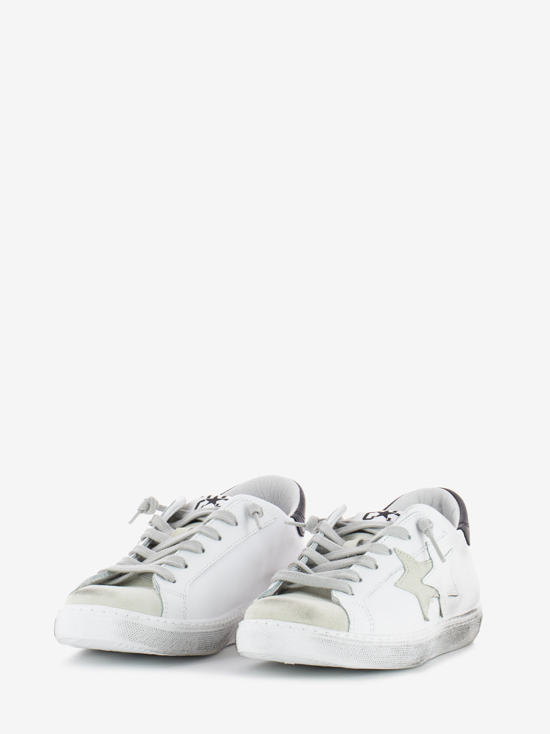 Low sneakers white leather / black details