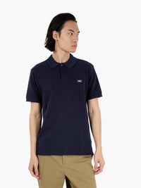 Polo with navy logo tag