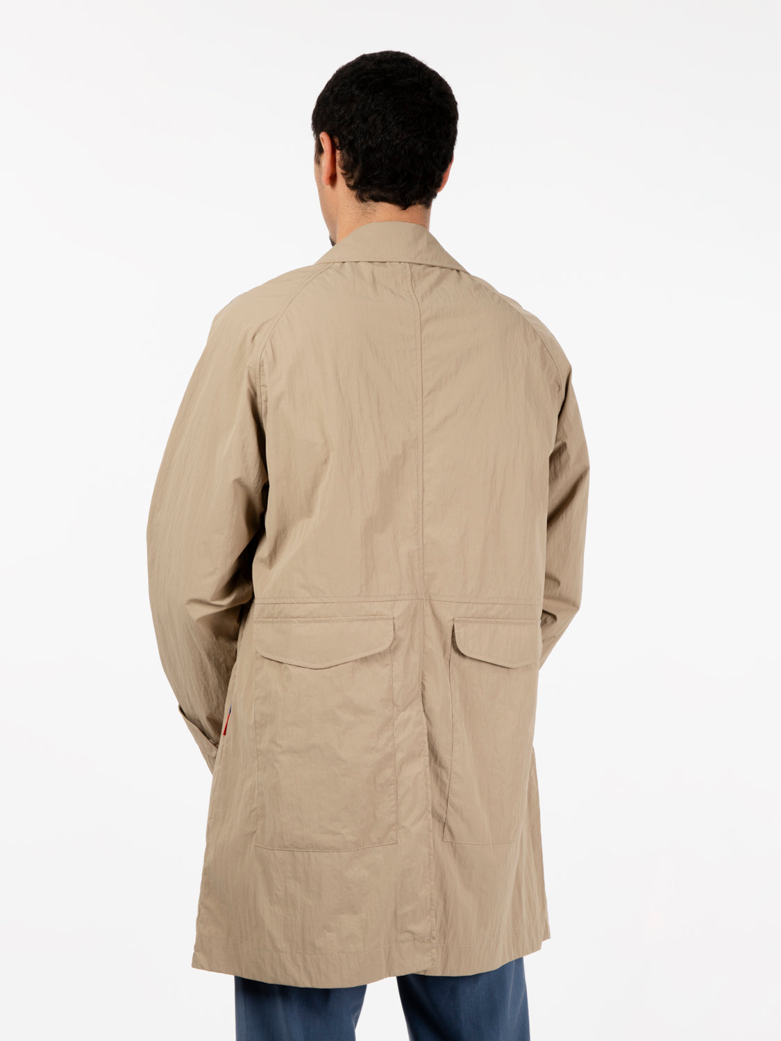 Beige multi-pocket trench coat