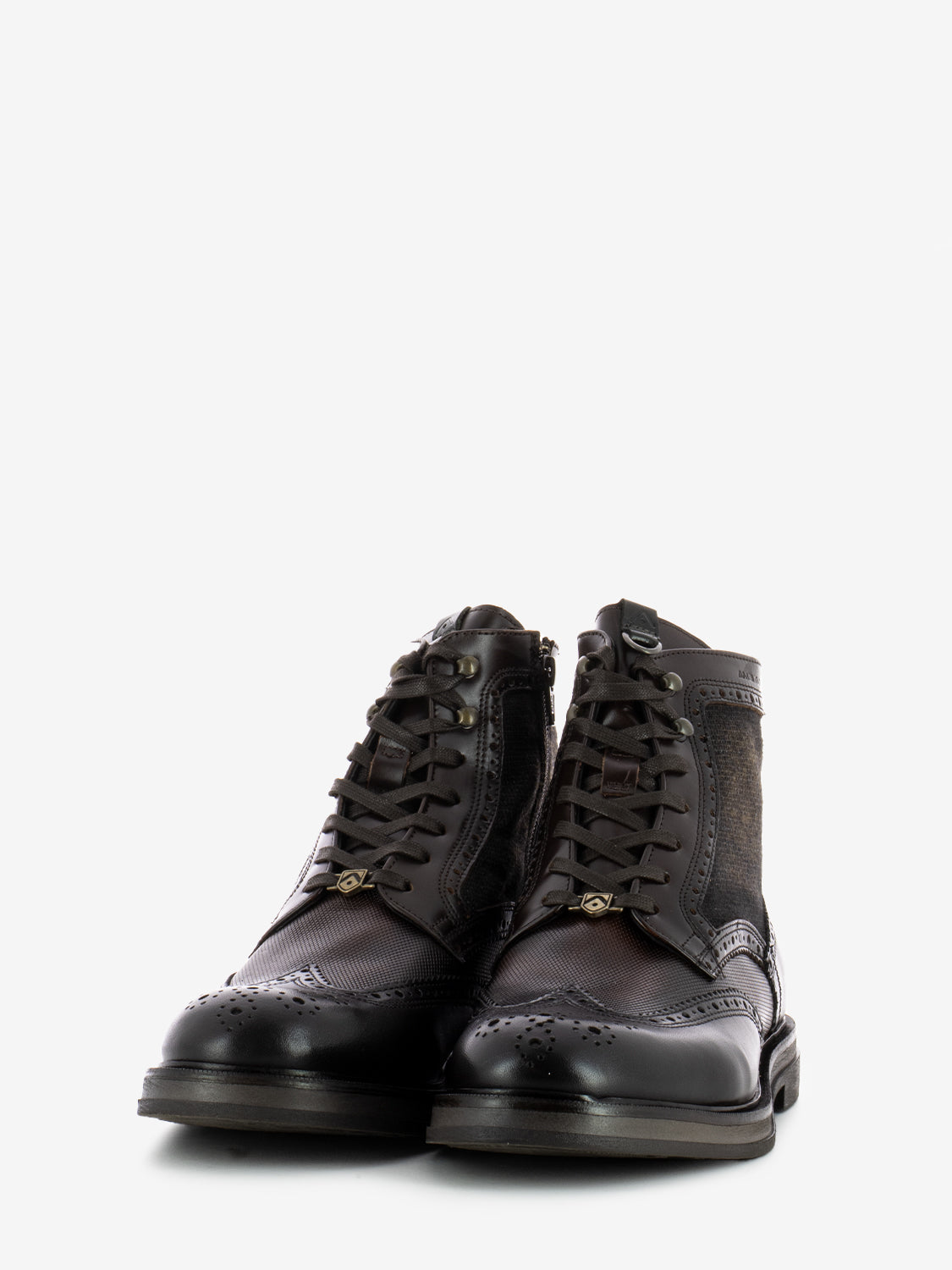 Leather ankle boots with all over brown brogue