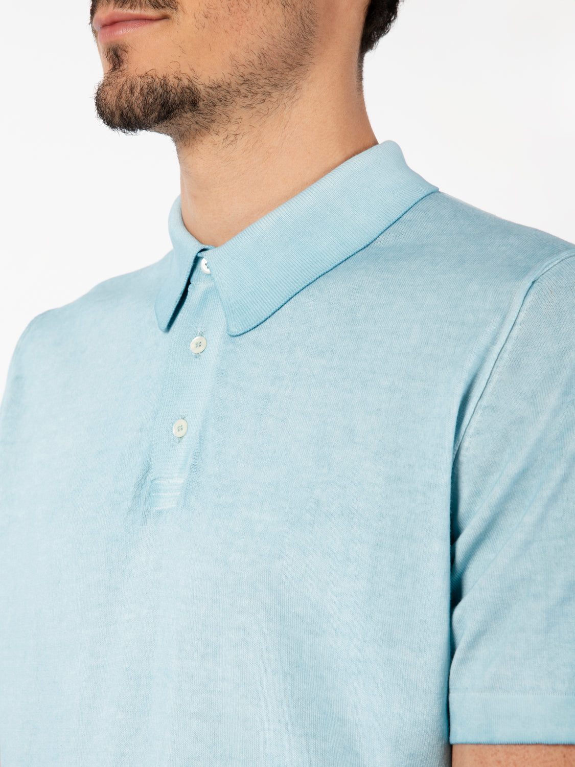 Light blue short-sleeved knitted polo shirt