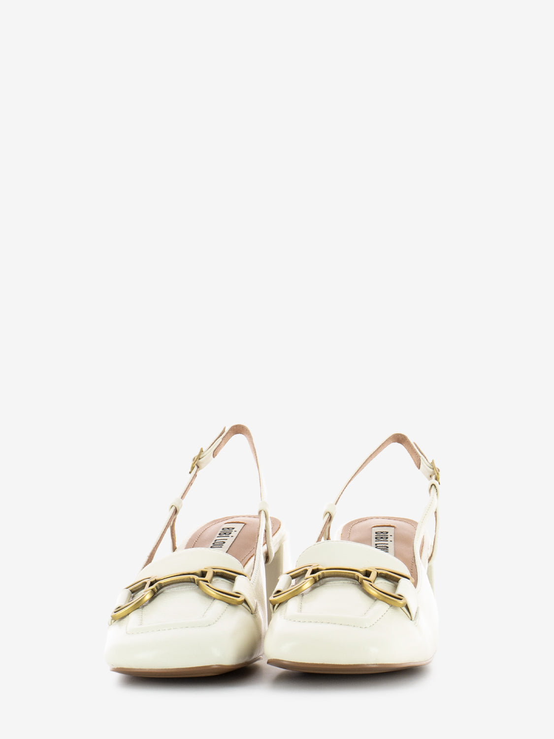 Chanel in leather with white block heel
