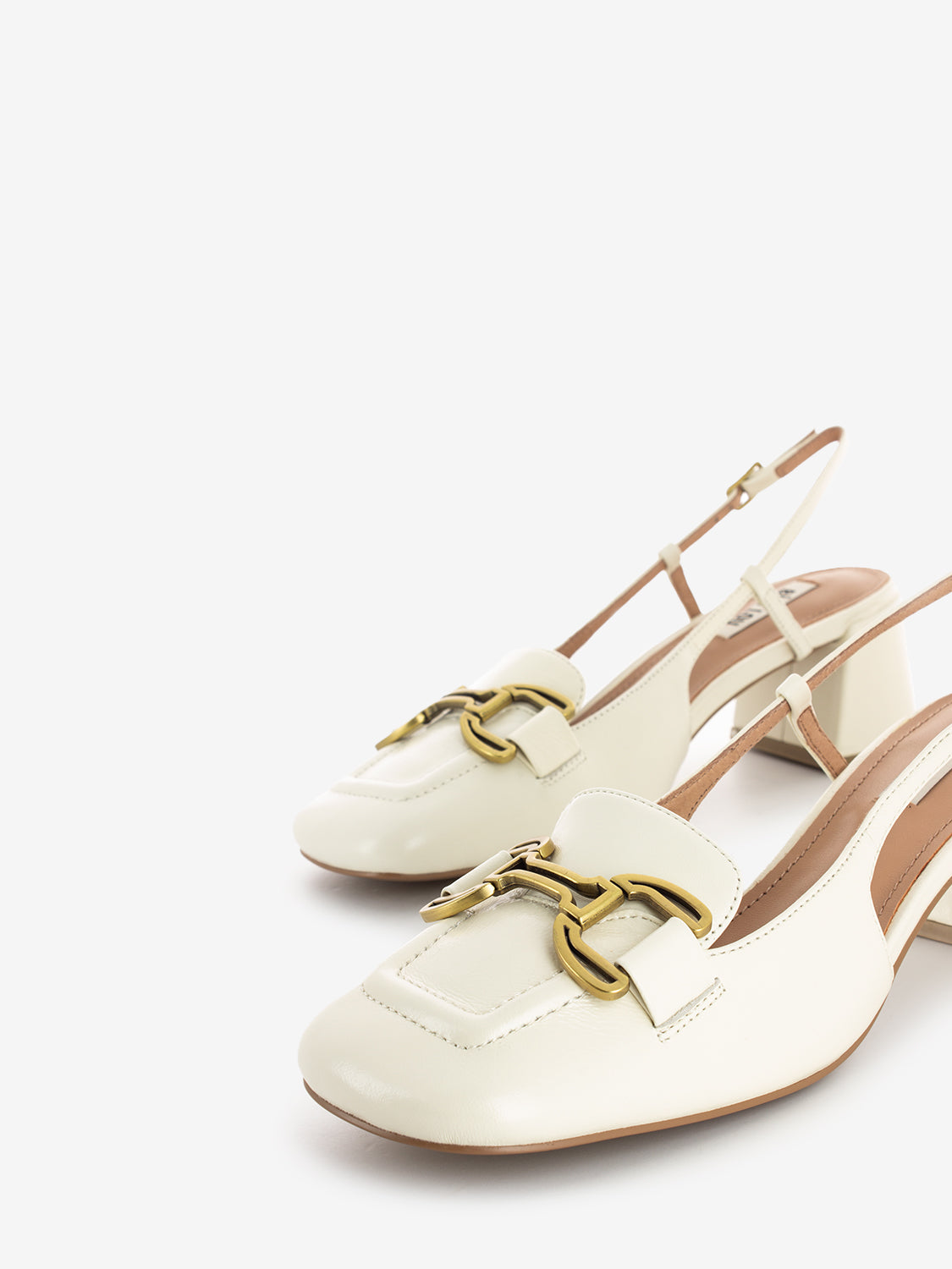 Chanel in leather with white block heel