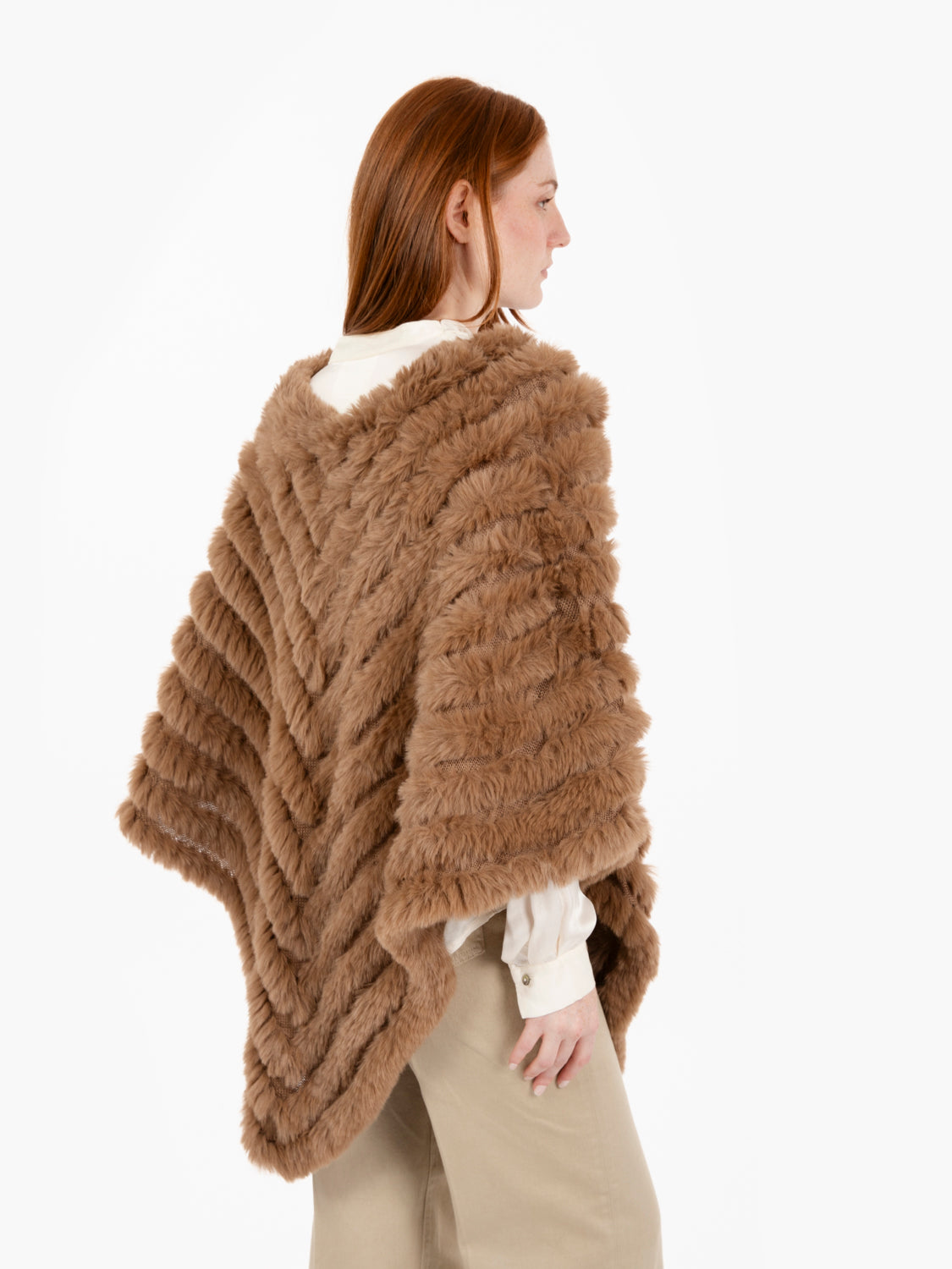 Faux fur poncho with toasted coconut brooch