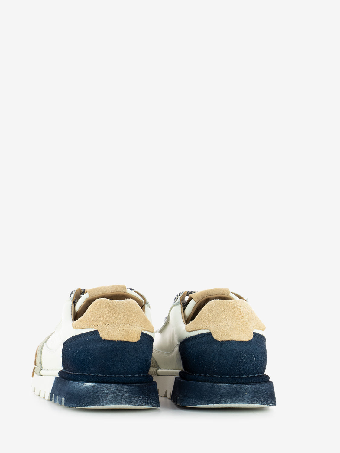 Sneakers in pelle bianco / jeans