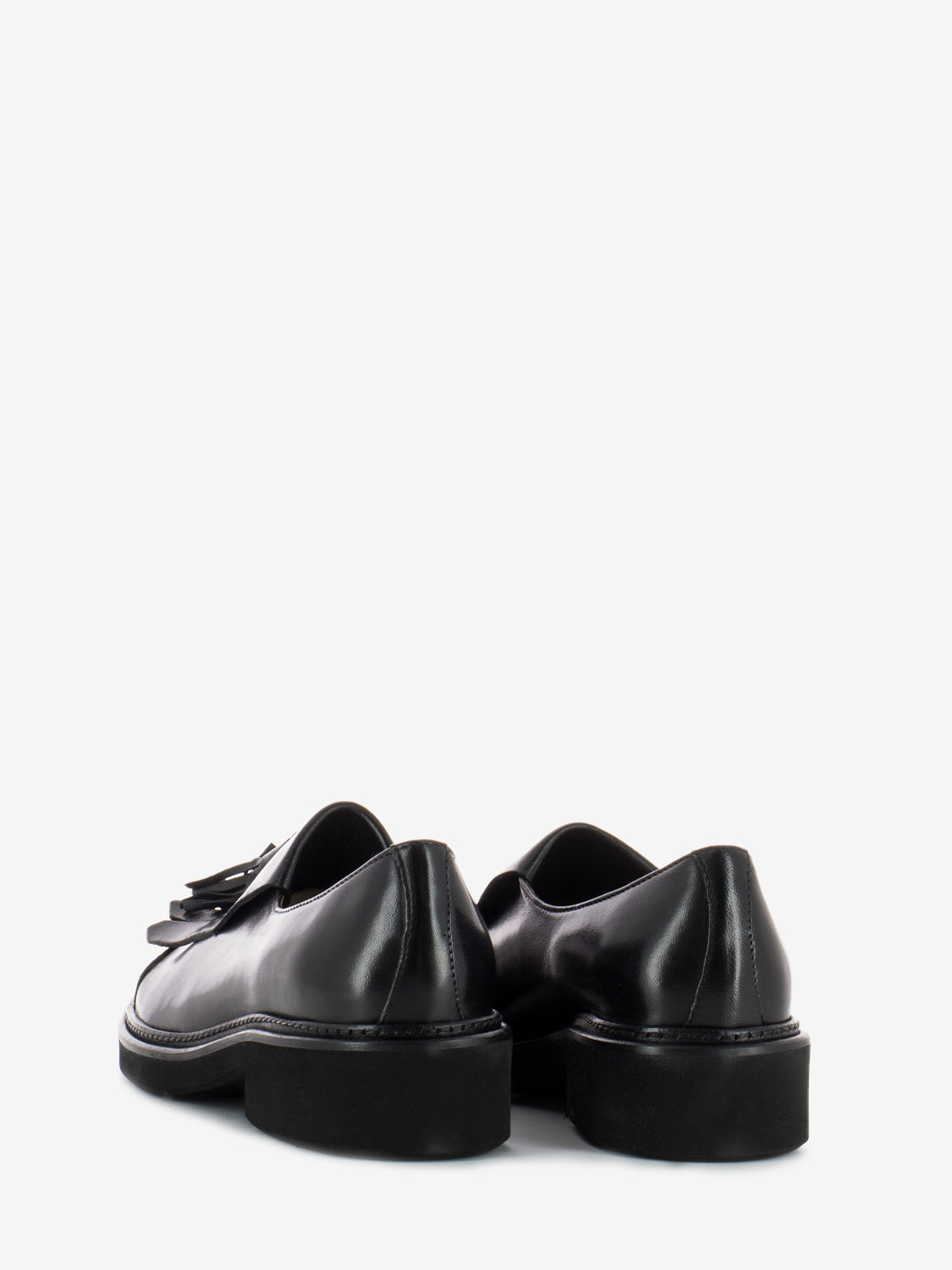 Black fringe and tassel shoe