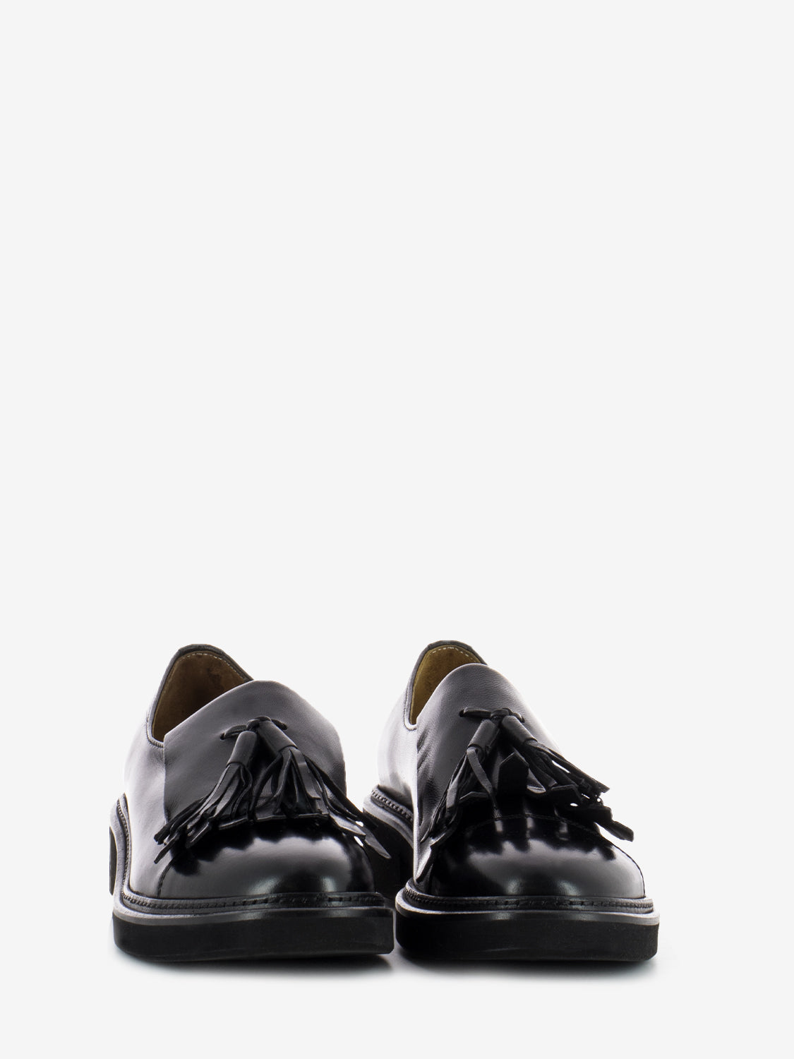 Black fringe and tassel shoe
