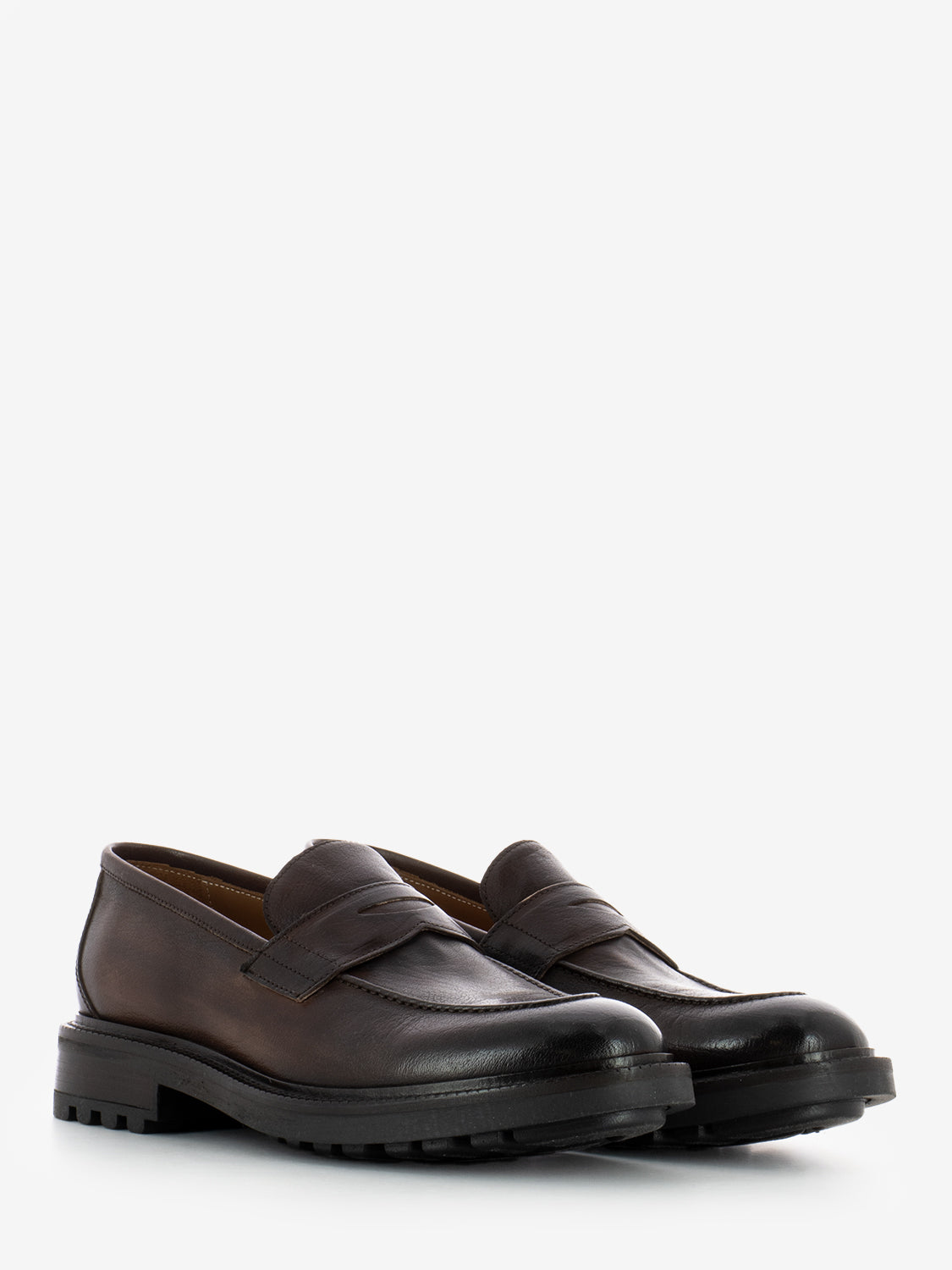 Moccasins in dark brown leather