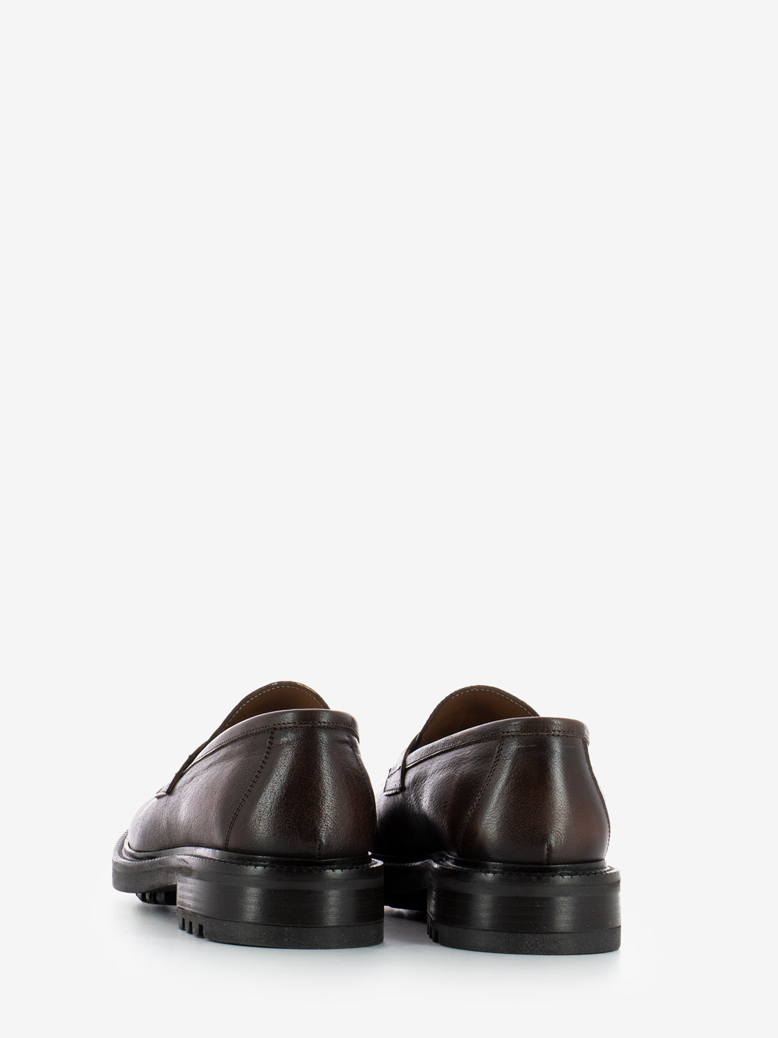 Moccasins in dark brown leather