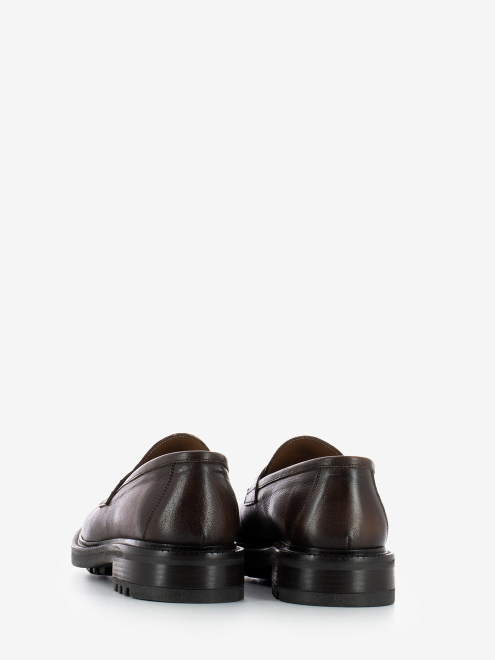 Moccasins in dark brown leather