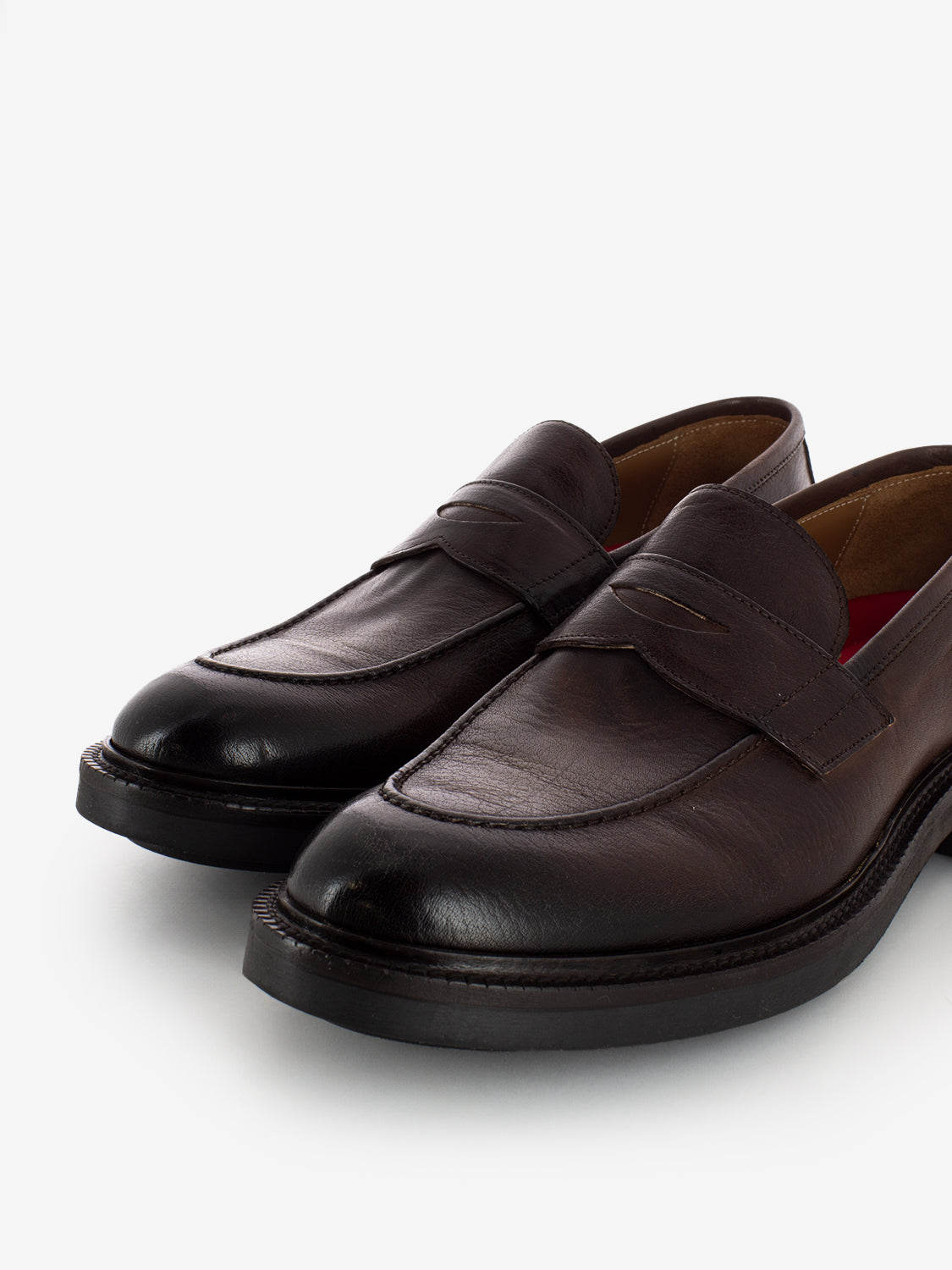 Moccasins in dark brown leather