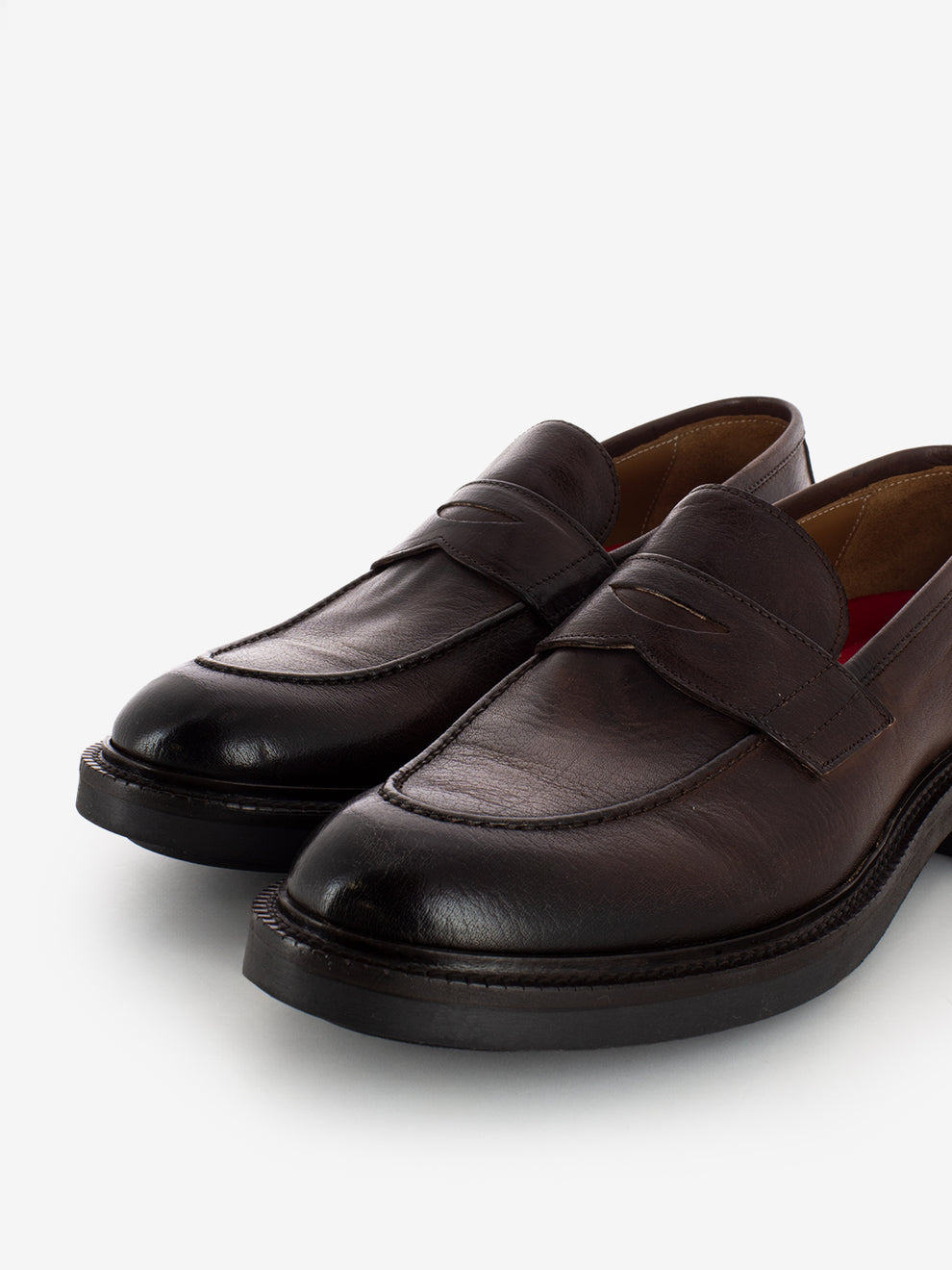 Moccasins in dark brown leather