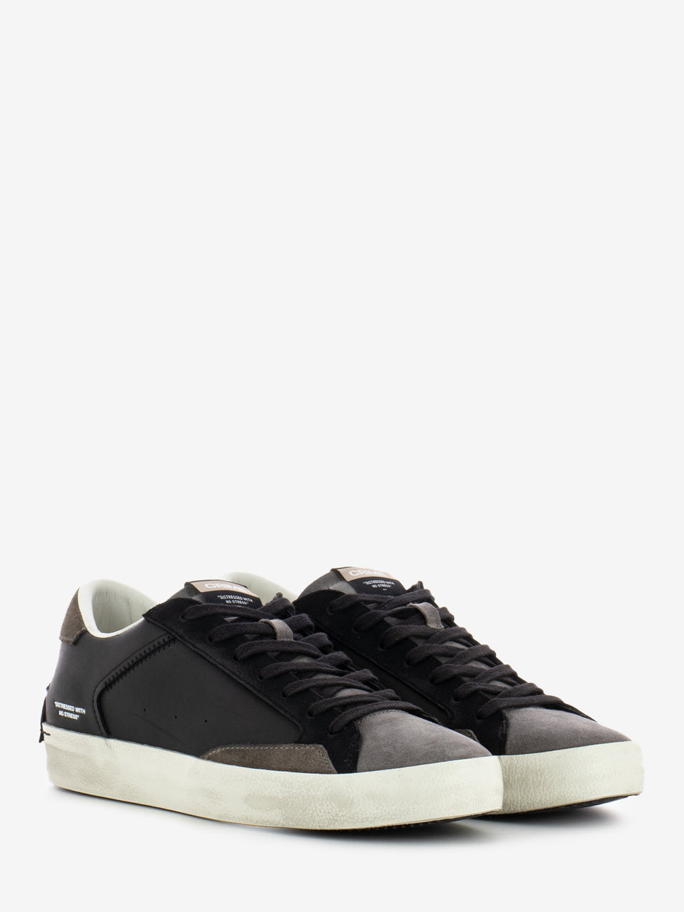Distressed black sneakers