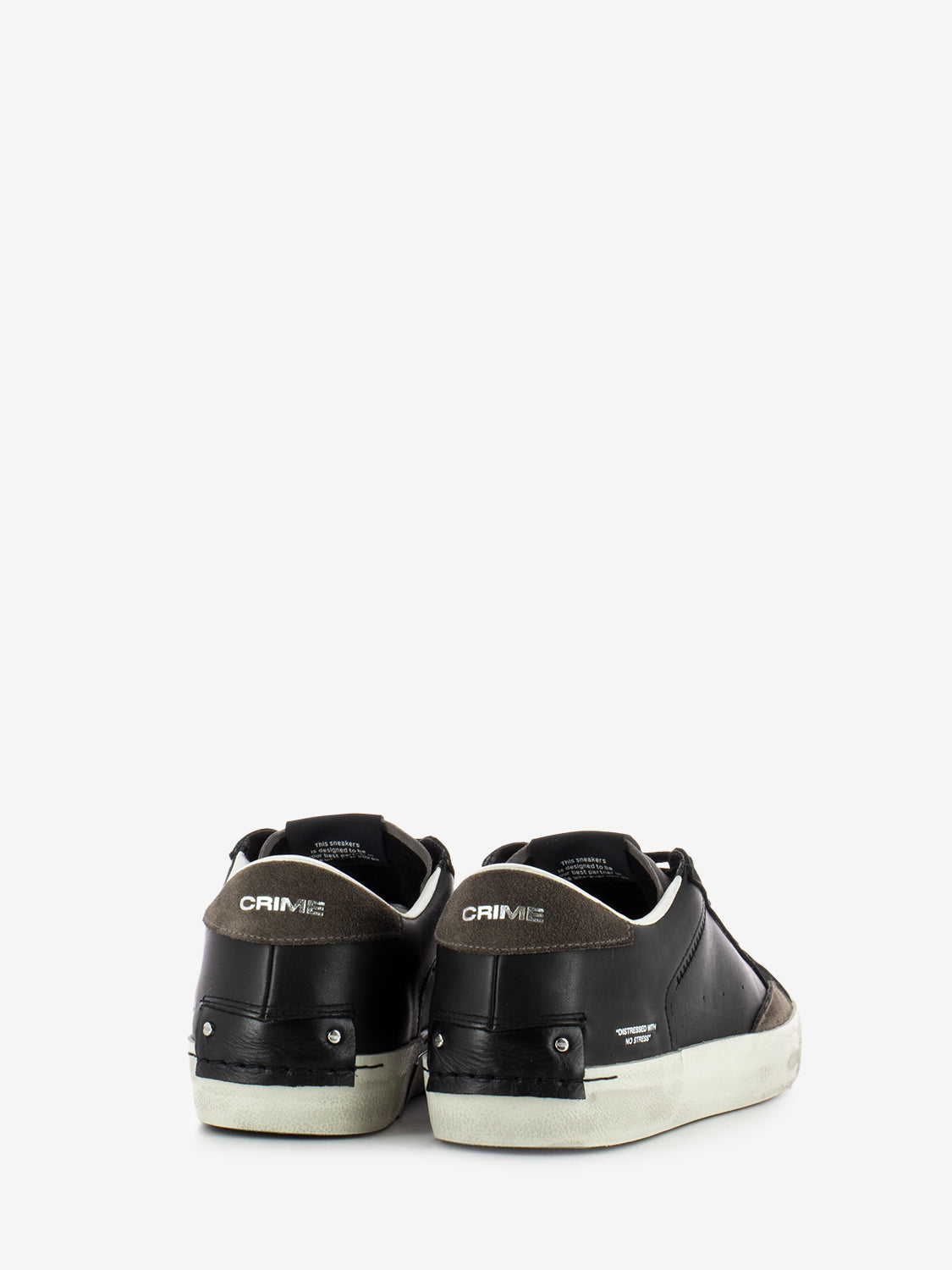 Distressed black sneakers