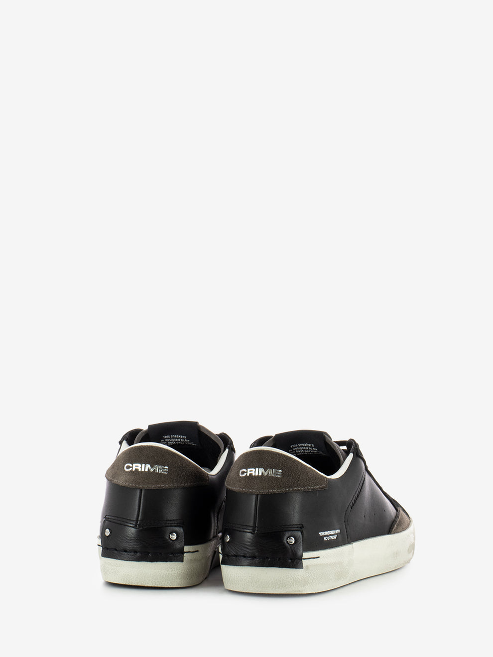 Distressed black sneakers