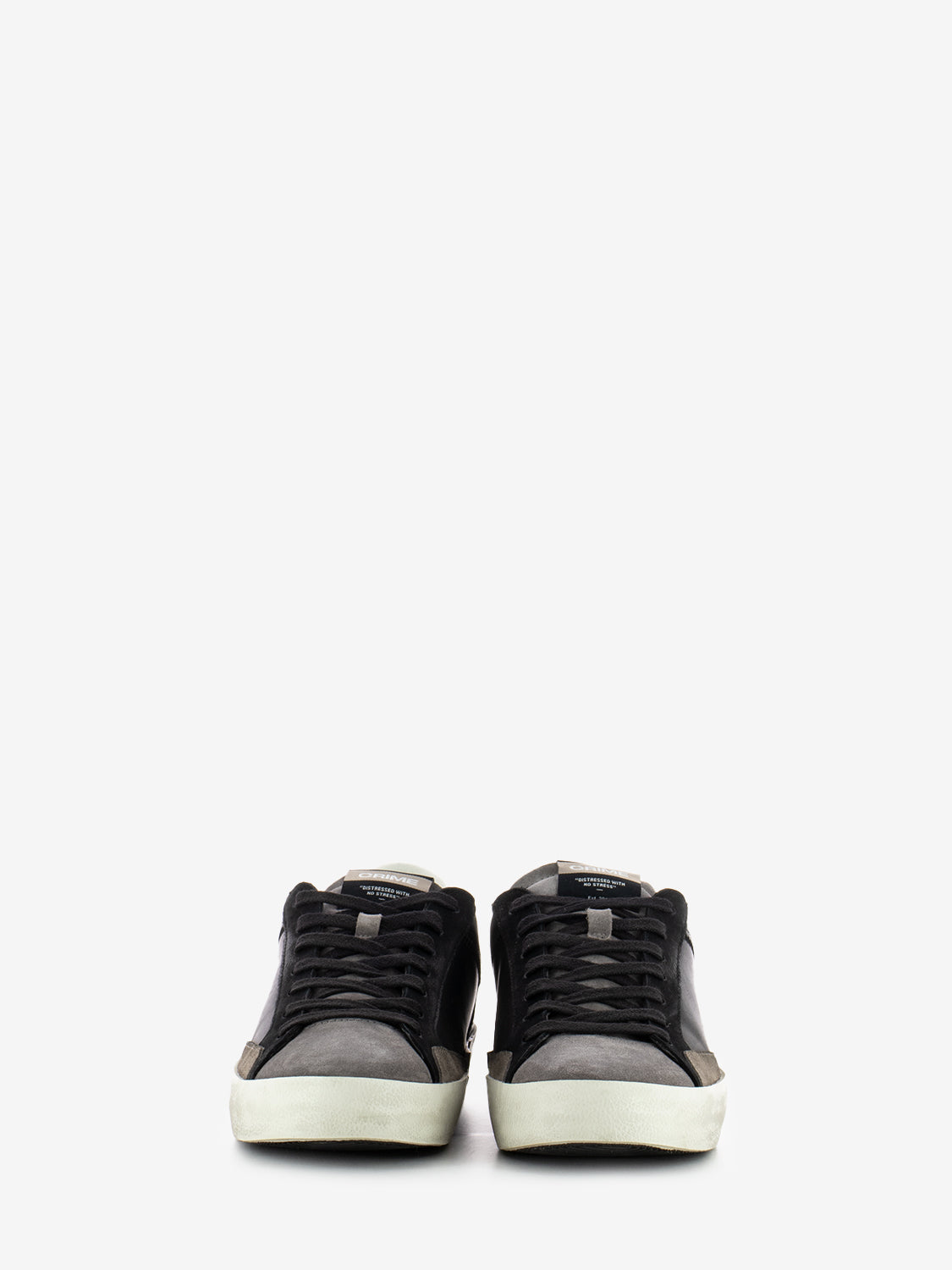Distressed black sneakers