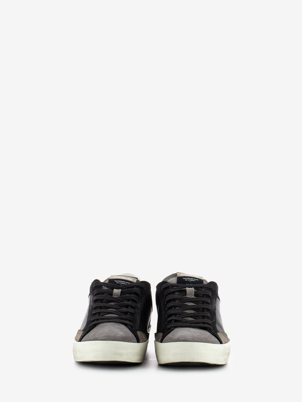 Distressed black sneakers
