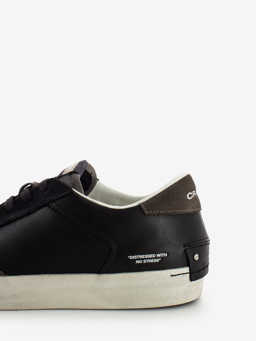 Distressed black sneakers