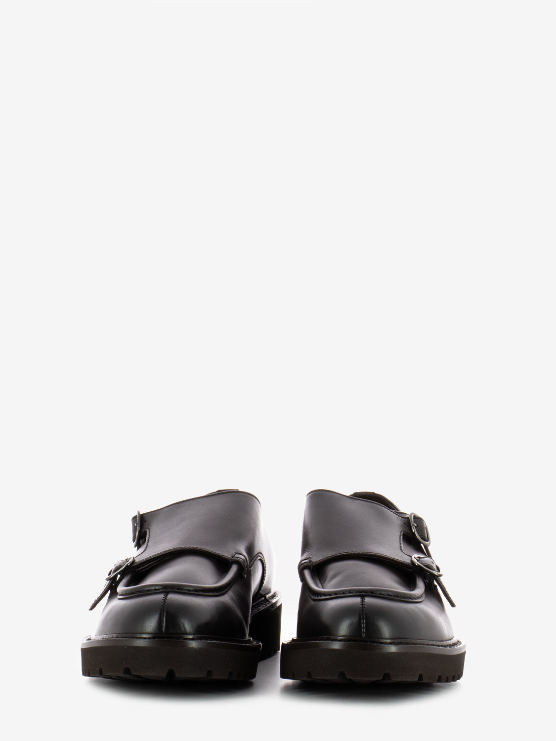 Double buckle moccasins with dark brown trim
