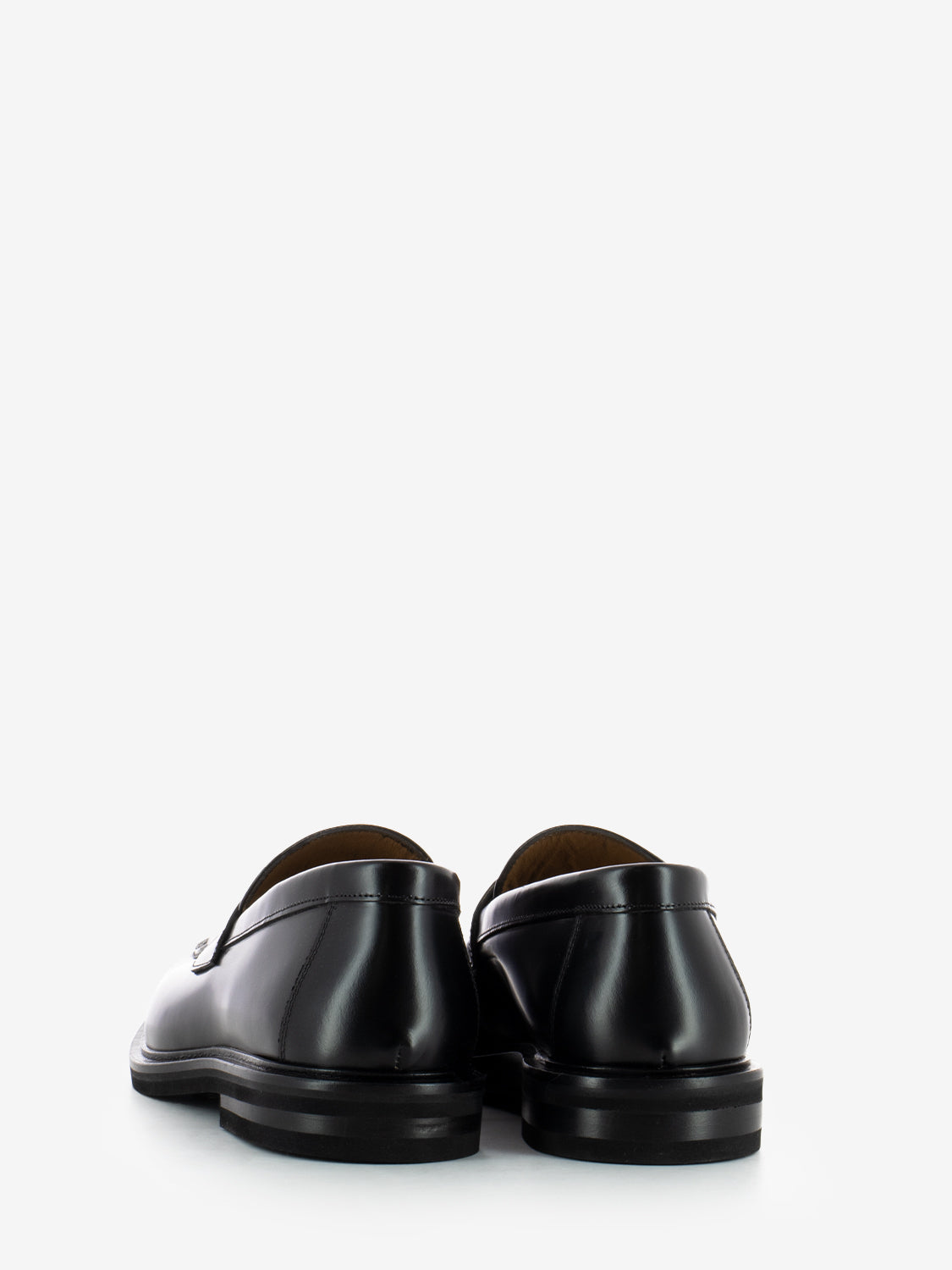 Mocassini con fascia penny e nappe nero