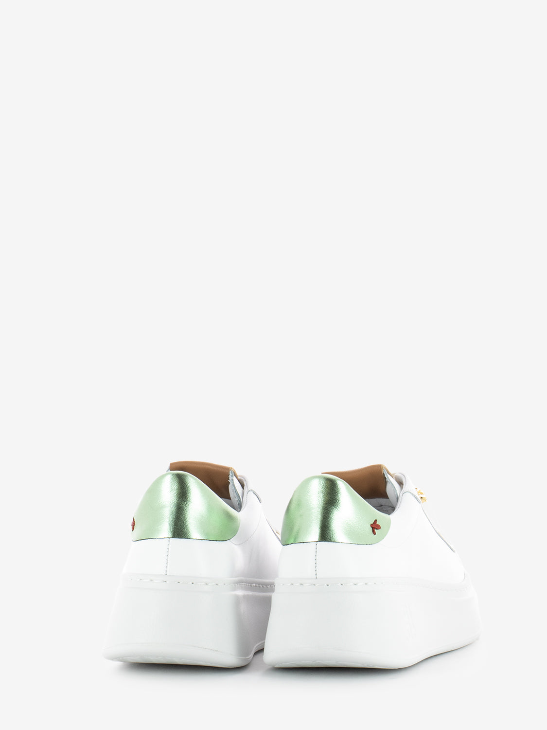 Sneakers with white / green frog brooch