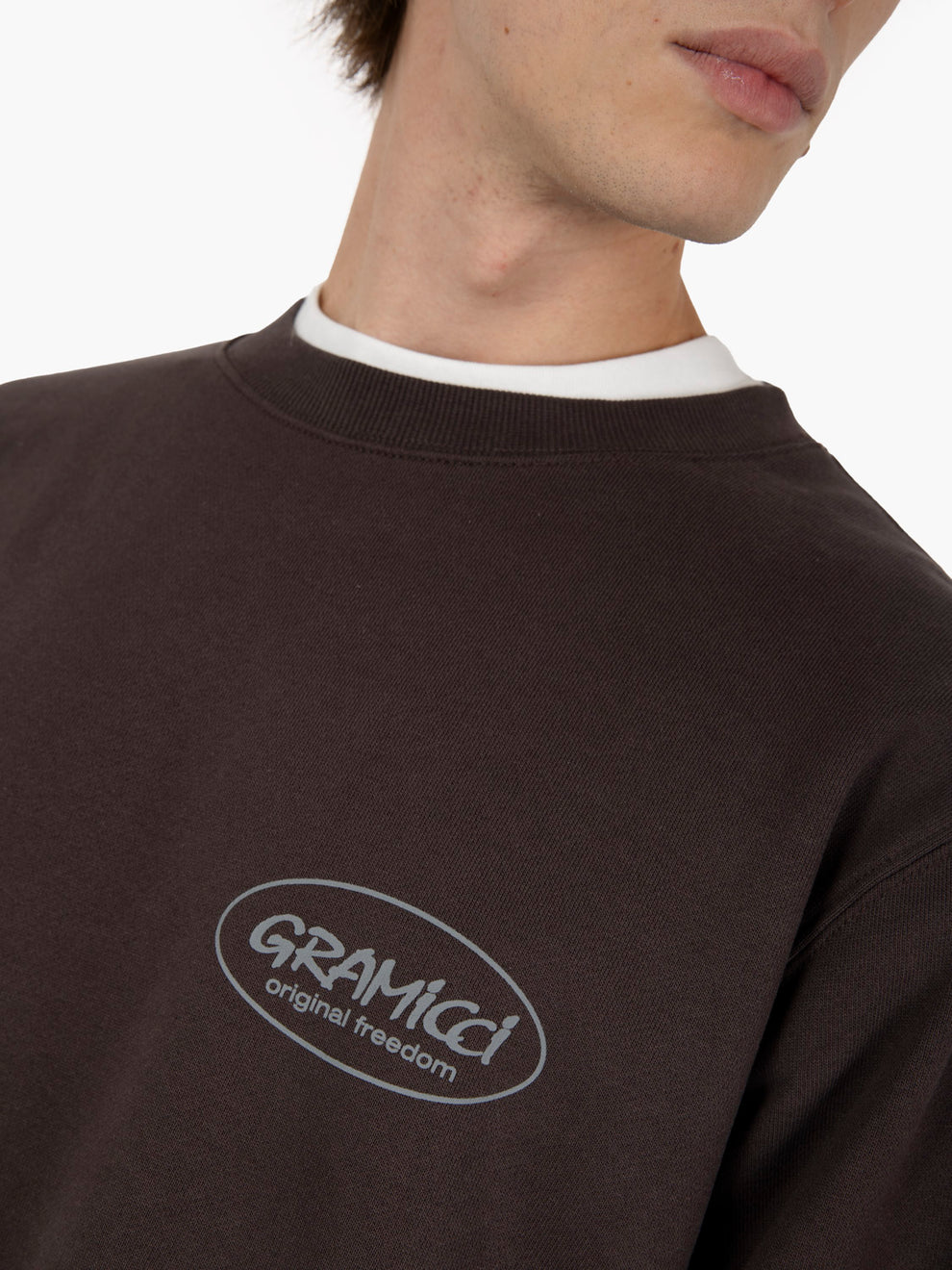Brown crewneck sweatshirt with graphic print
