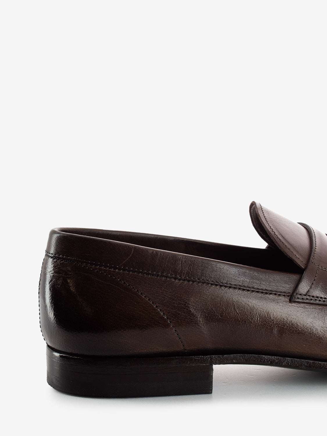 Moccasins in dark brown leather