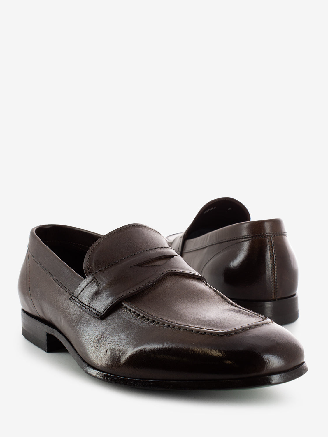 Moccasins in dark brown leather