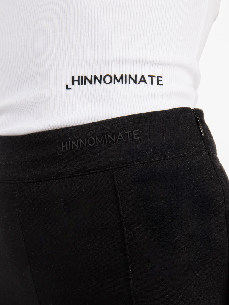 HINNOMINATE - Pantalone flared stretch nero