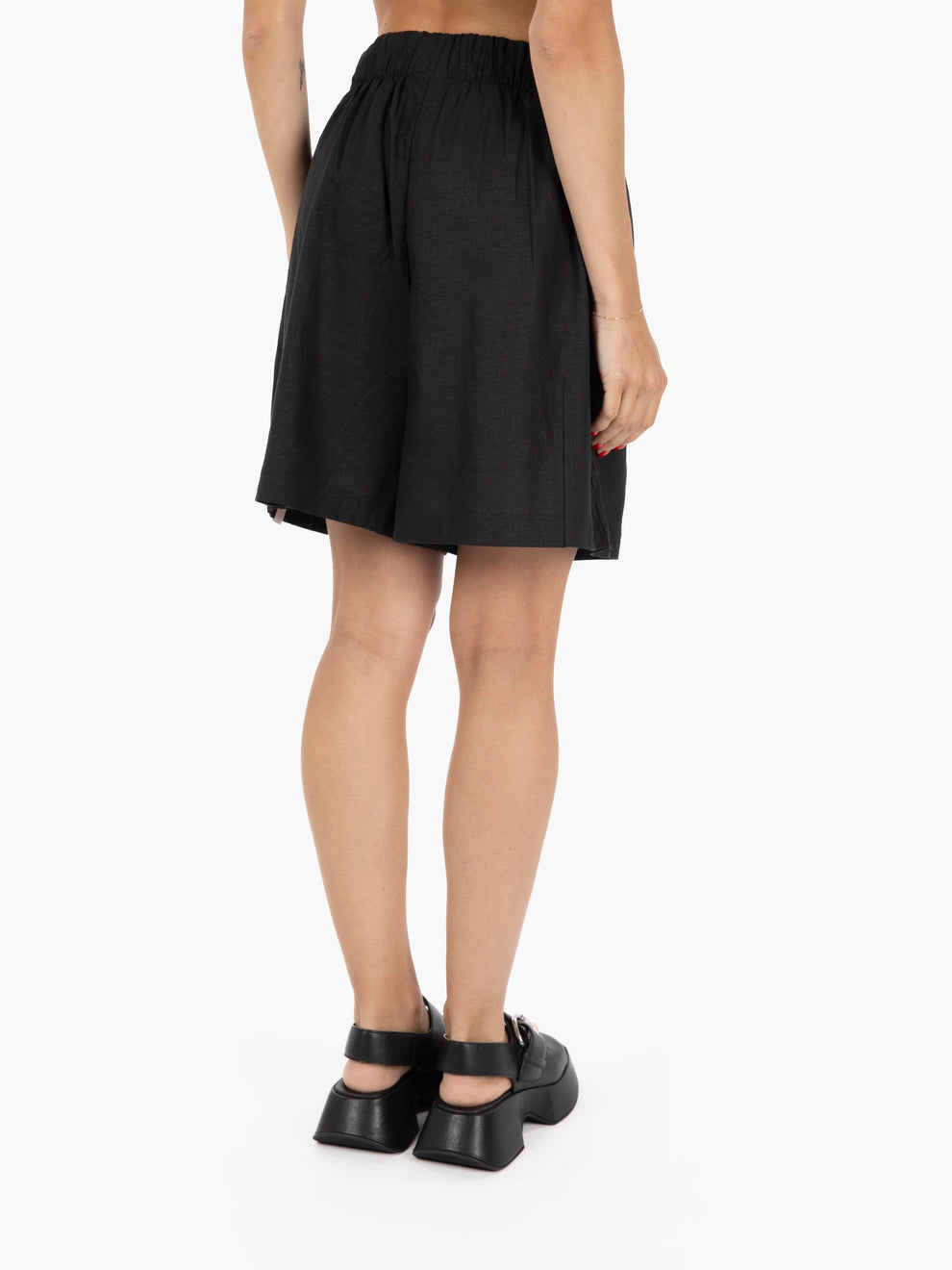 Linen shorts with black elastic waist