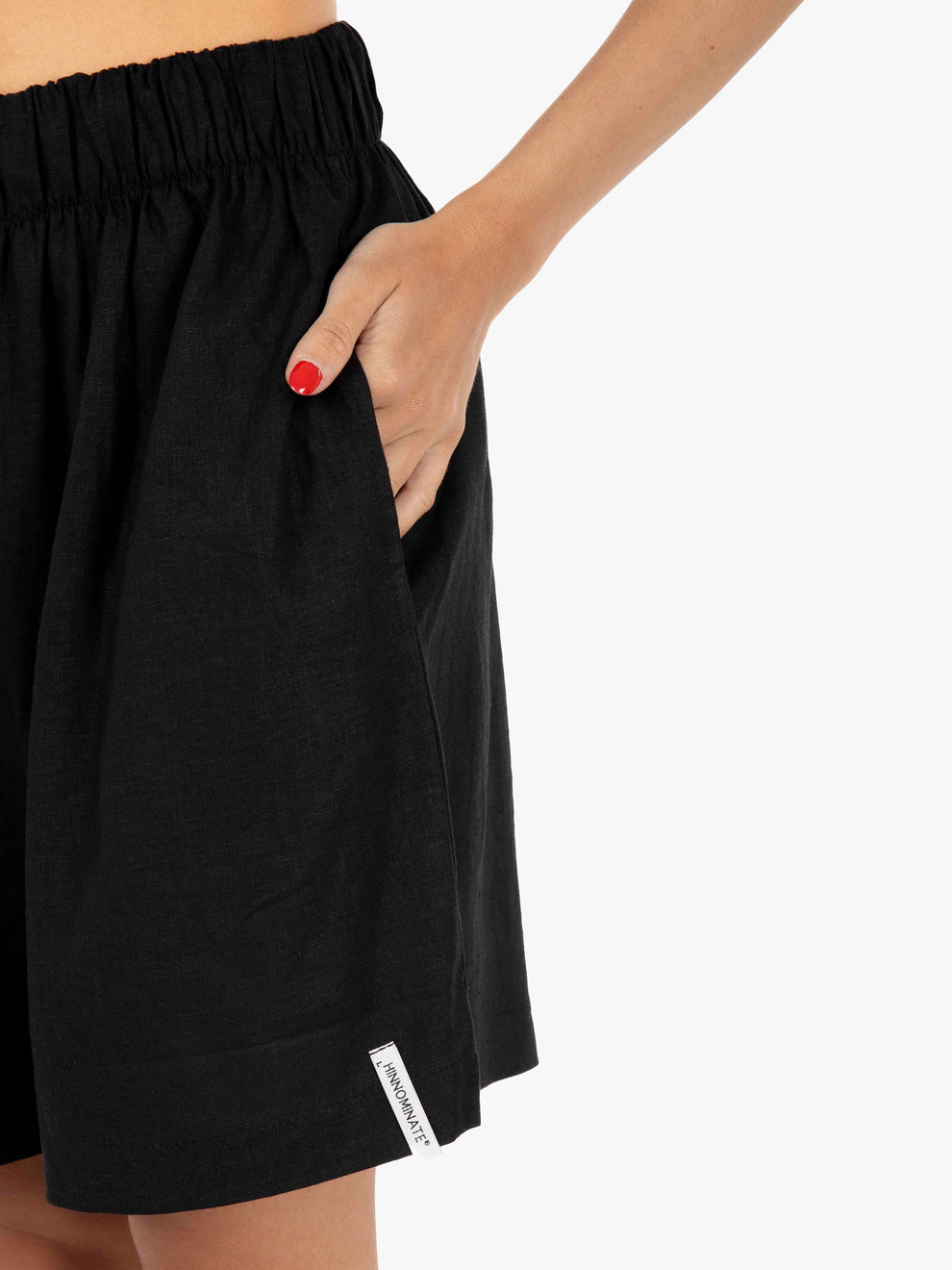 Linen shorts with black elastic waist