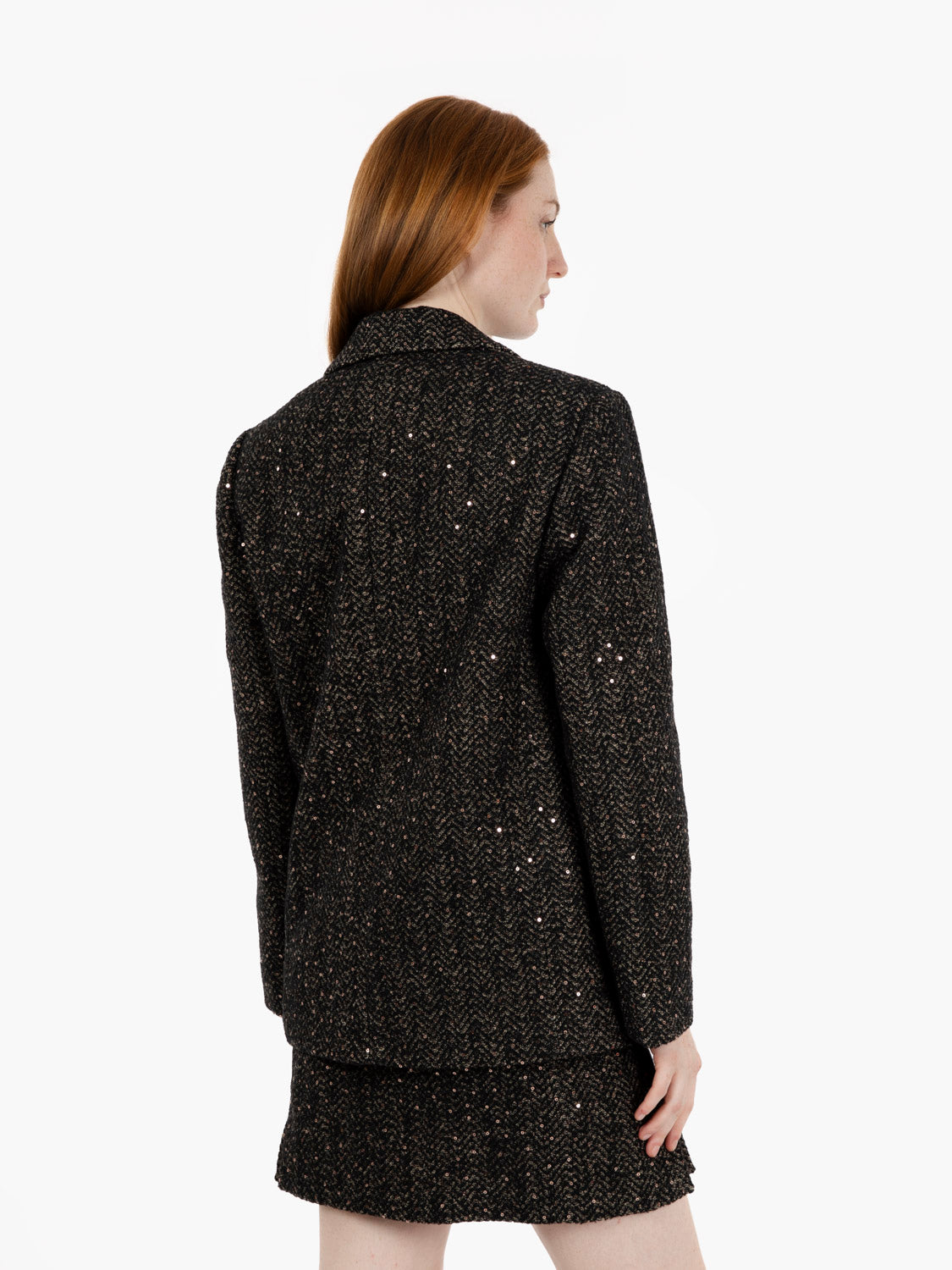 Blazer with sequins and dark brown brooch