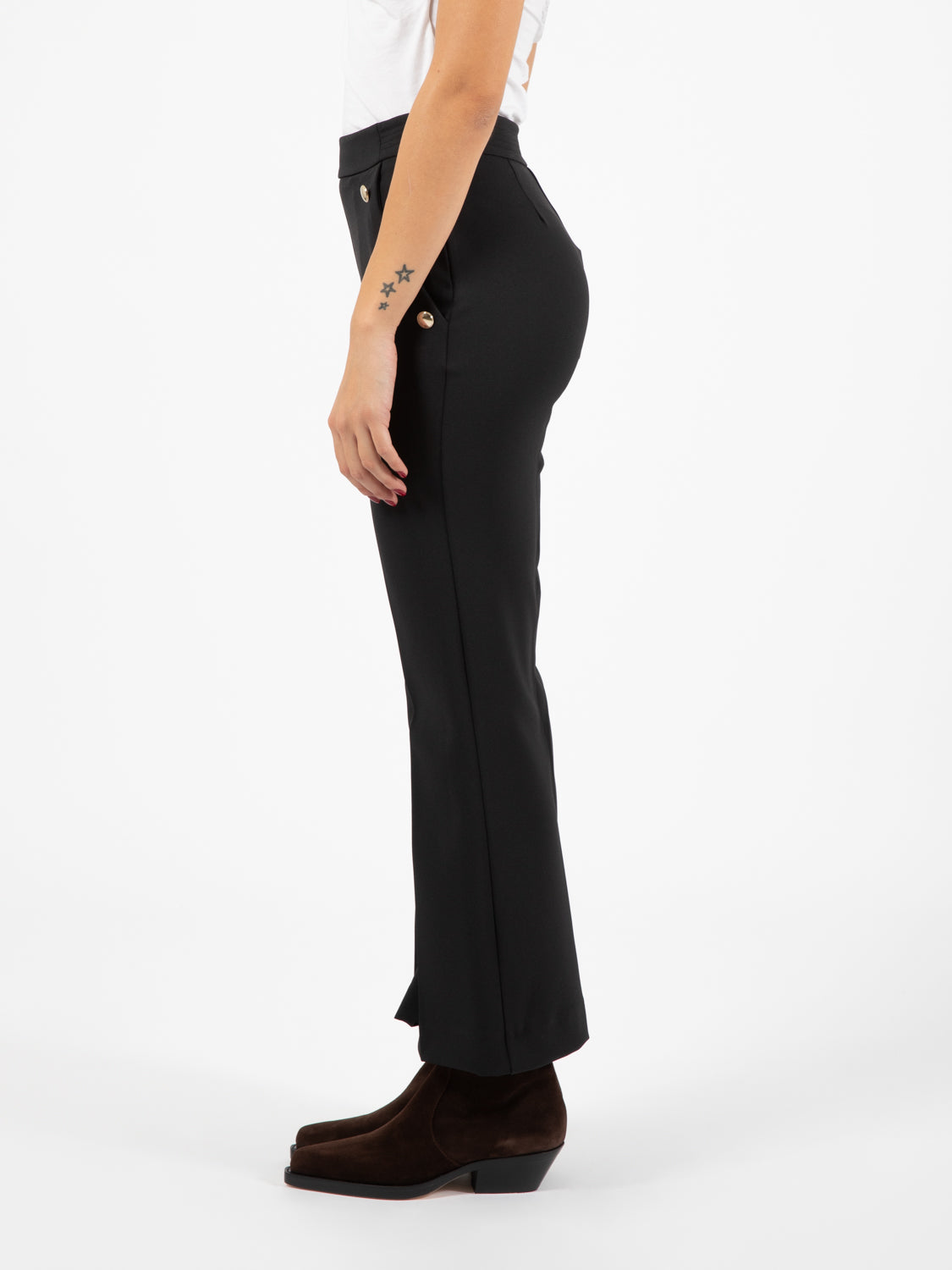 Black buttoned trumpet trousers