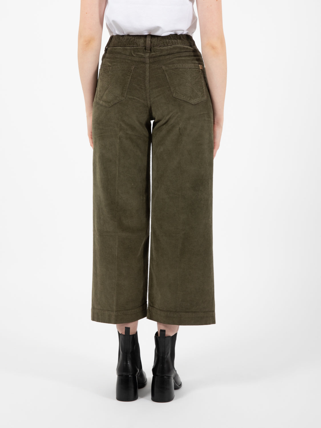 Green elastic velvet trousers
