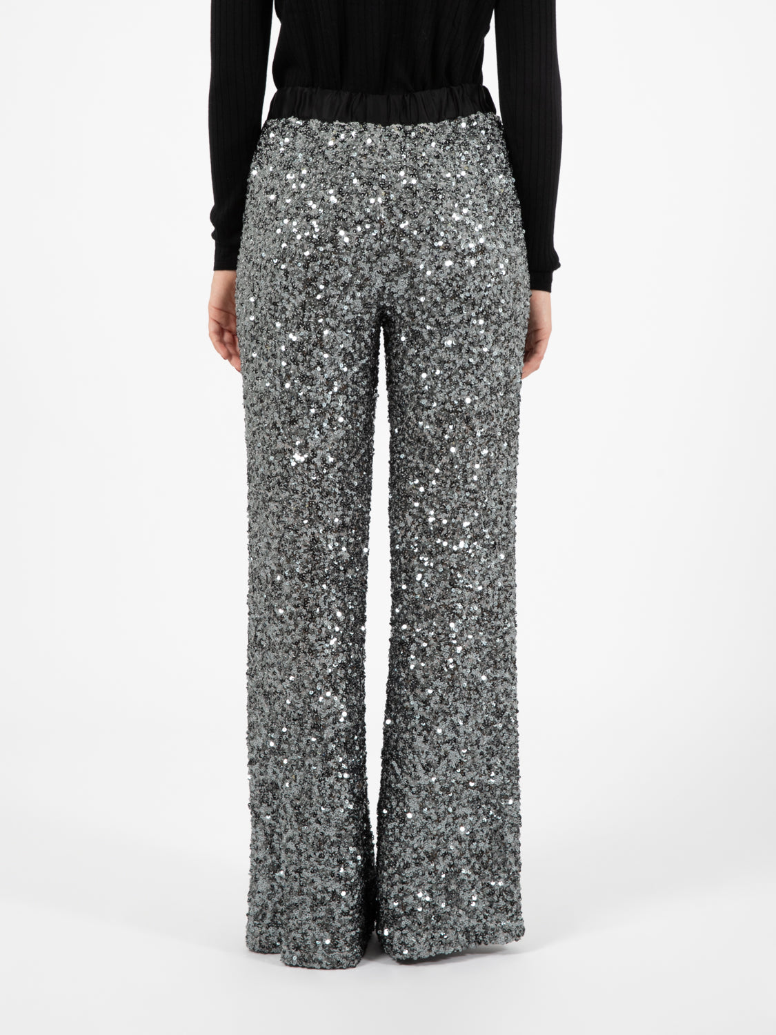 Stretch trousers with silver sequins