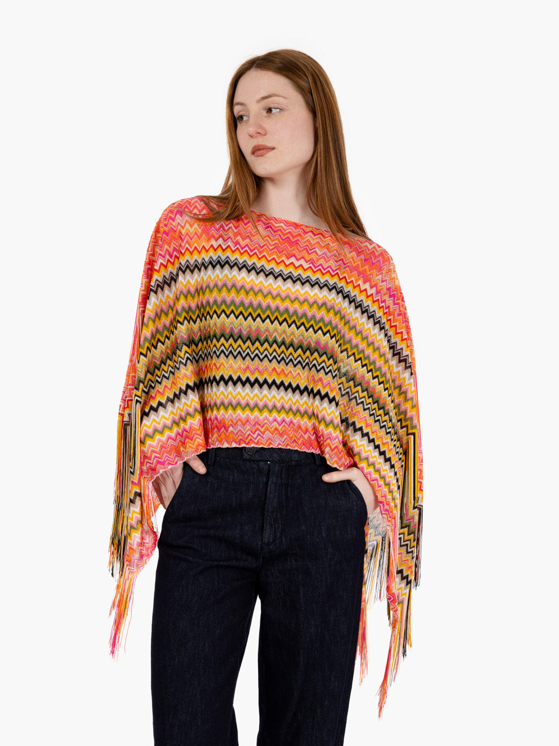 Short poncho with orange fringes