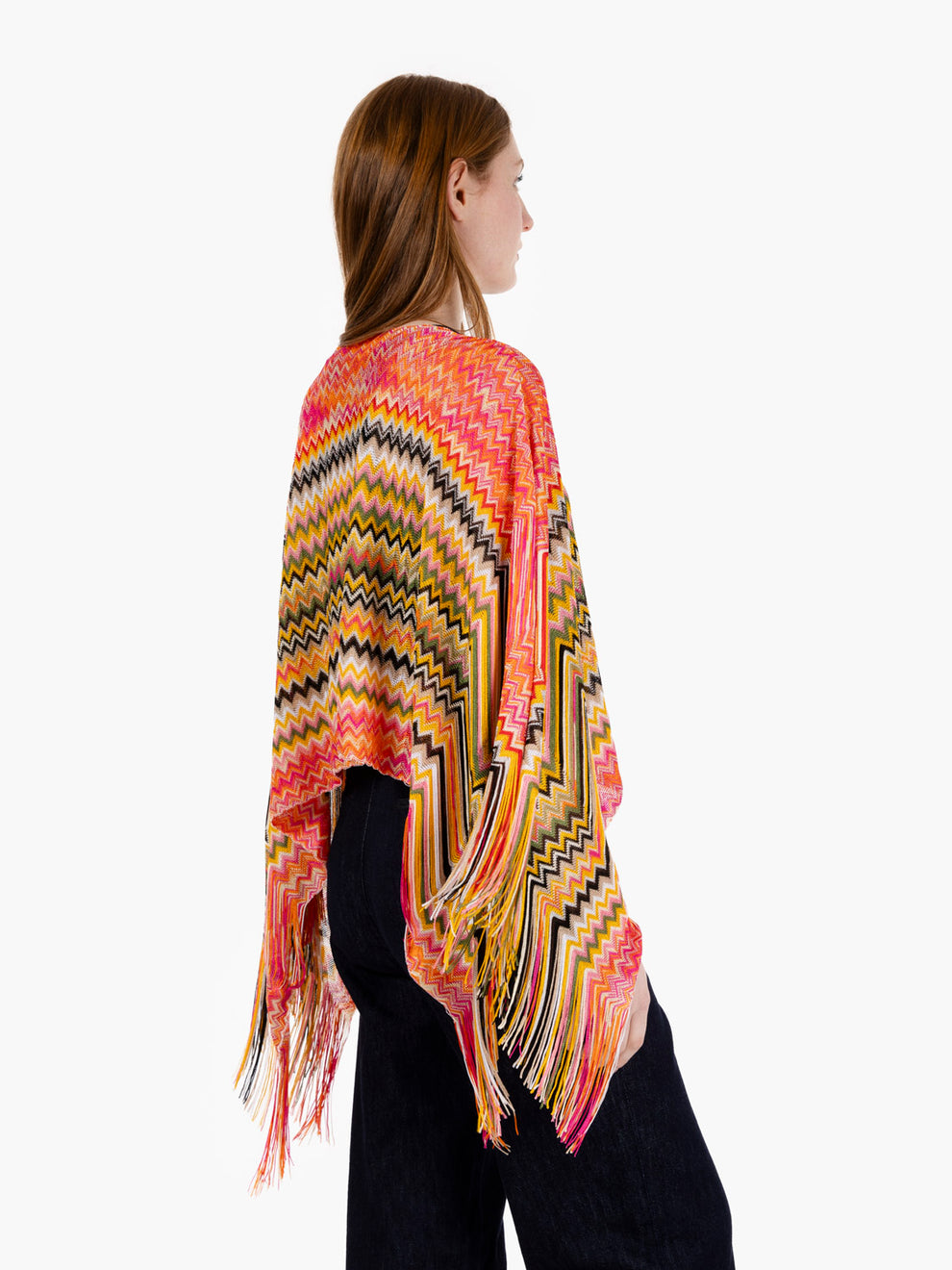 Short poncho with orange fringes