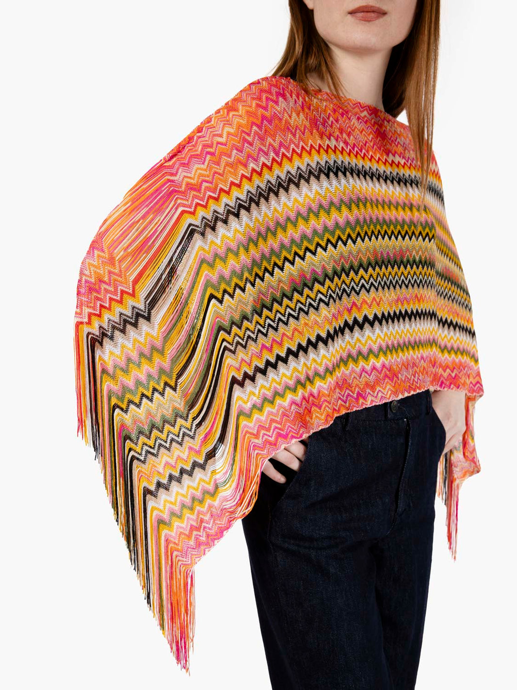 Poncho corto con frange arancio
