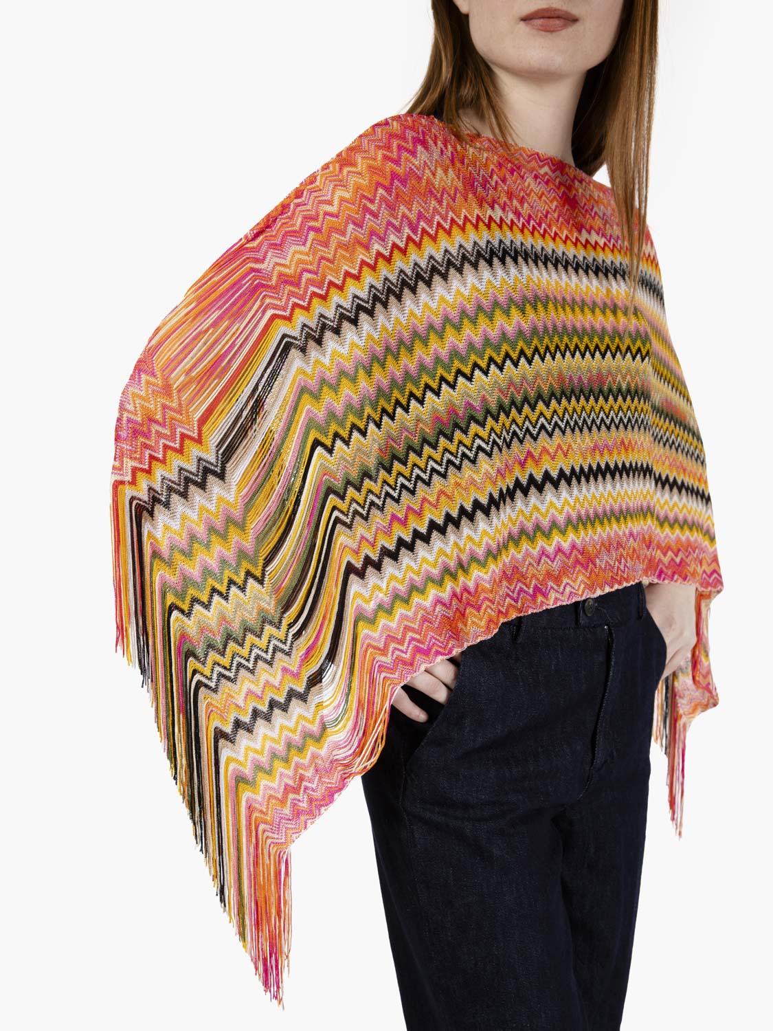 Short poncho with orange fringes