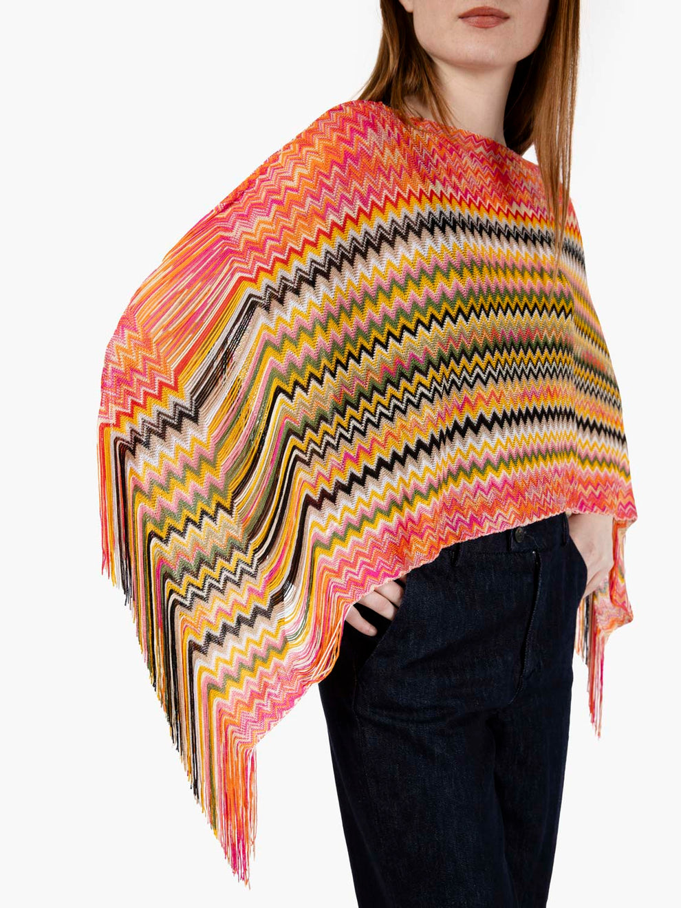 Short poncho with orange fringes