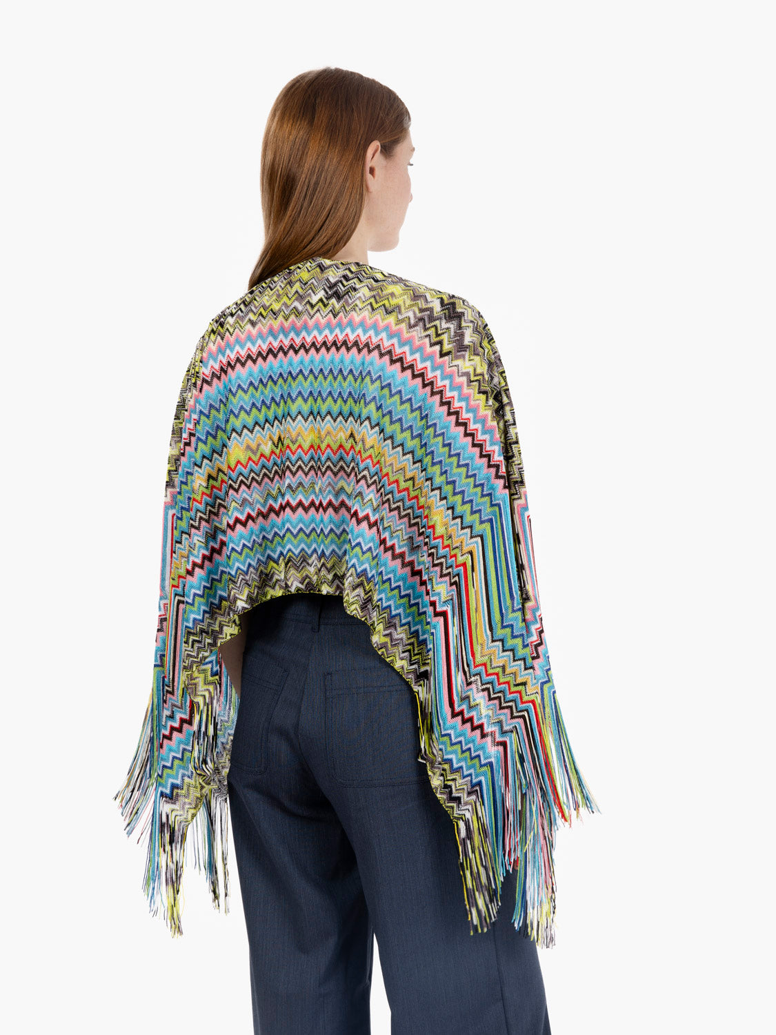 Short poncho with pink/blue fringes