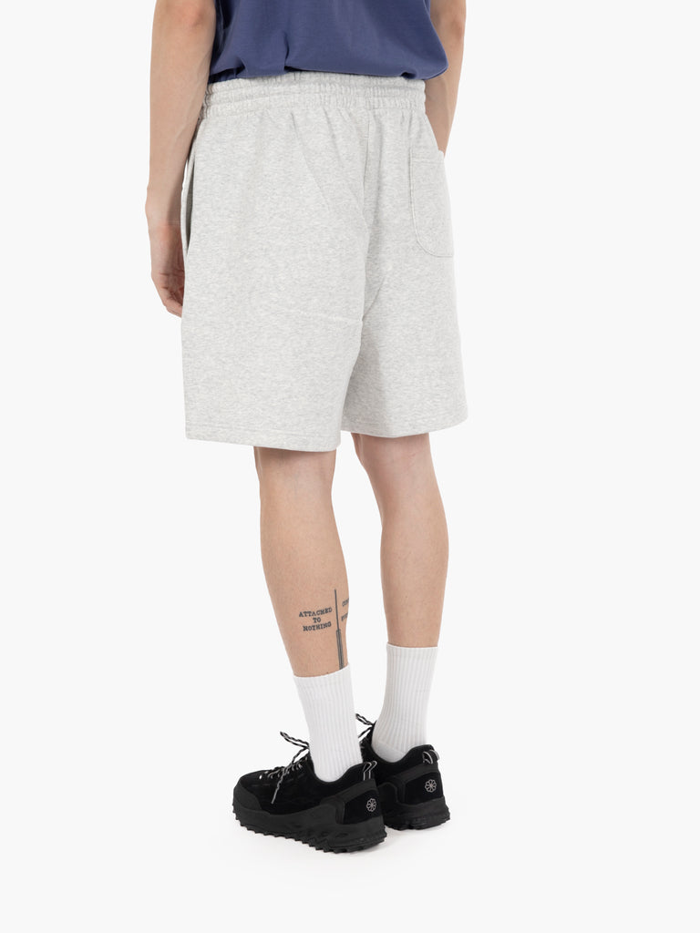 NEW BALANCE - Reimagined fleece graphic short 7 ash heather