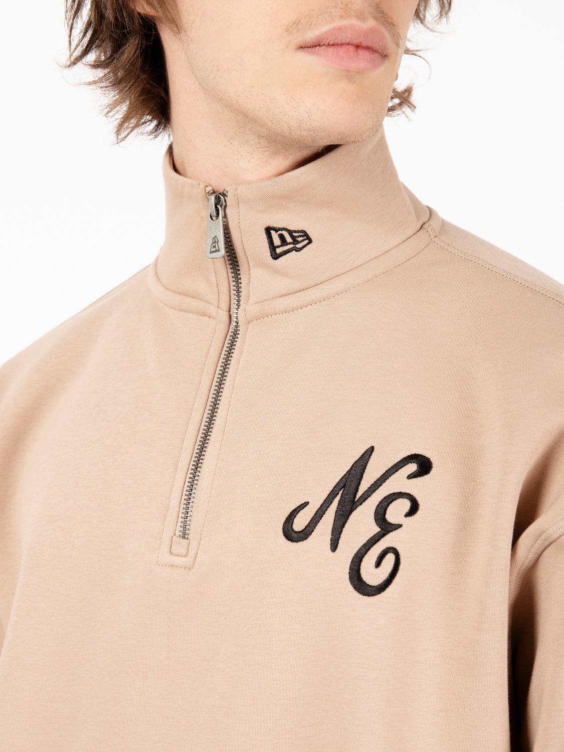 Beige quarter zip lifestyle sweatshirt