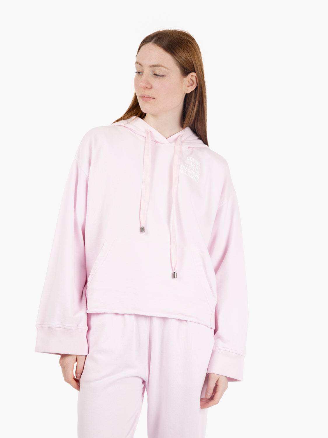 Felpa con fondo asimmetrico rosa