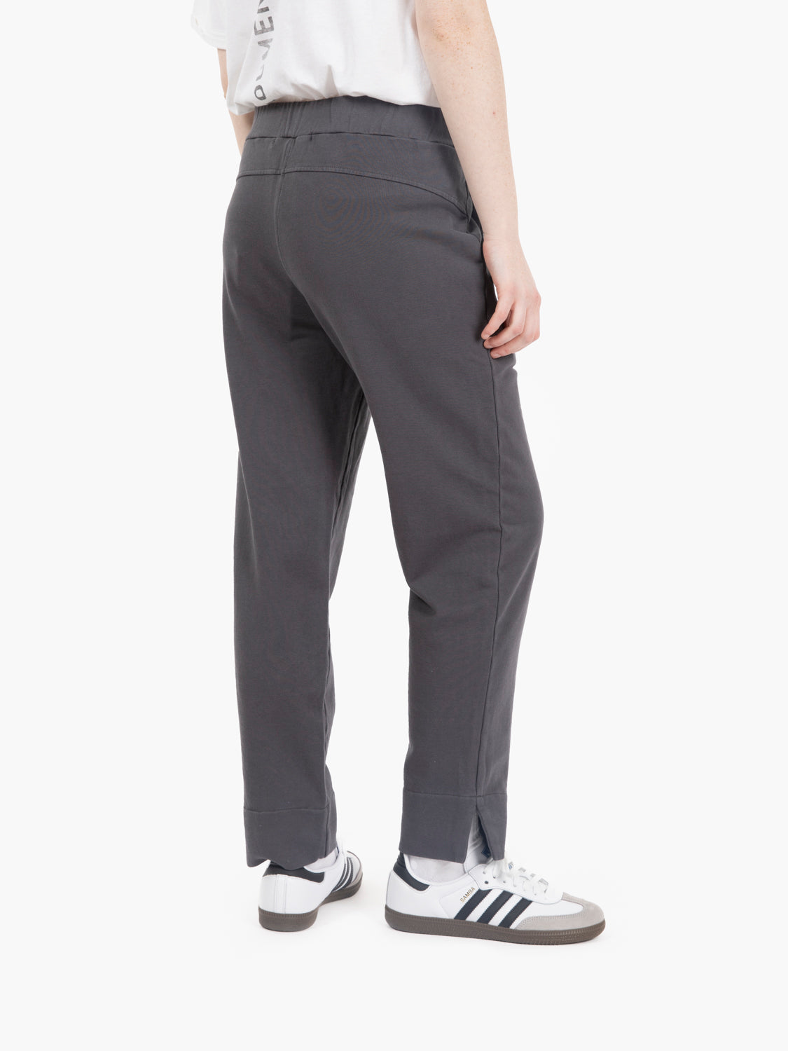 Pants with slit on the grey bottom