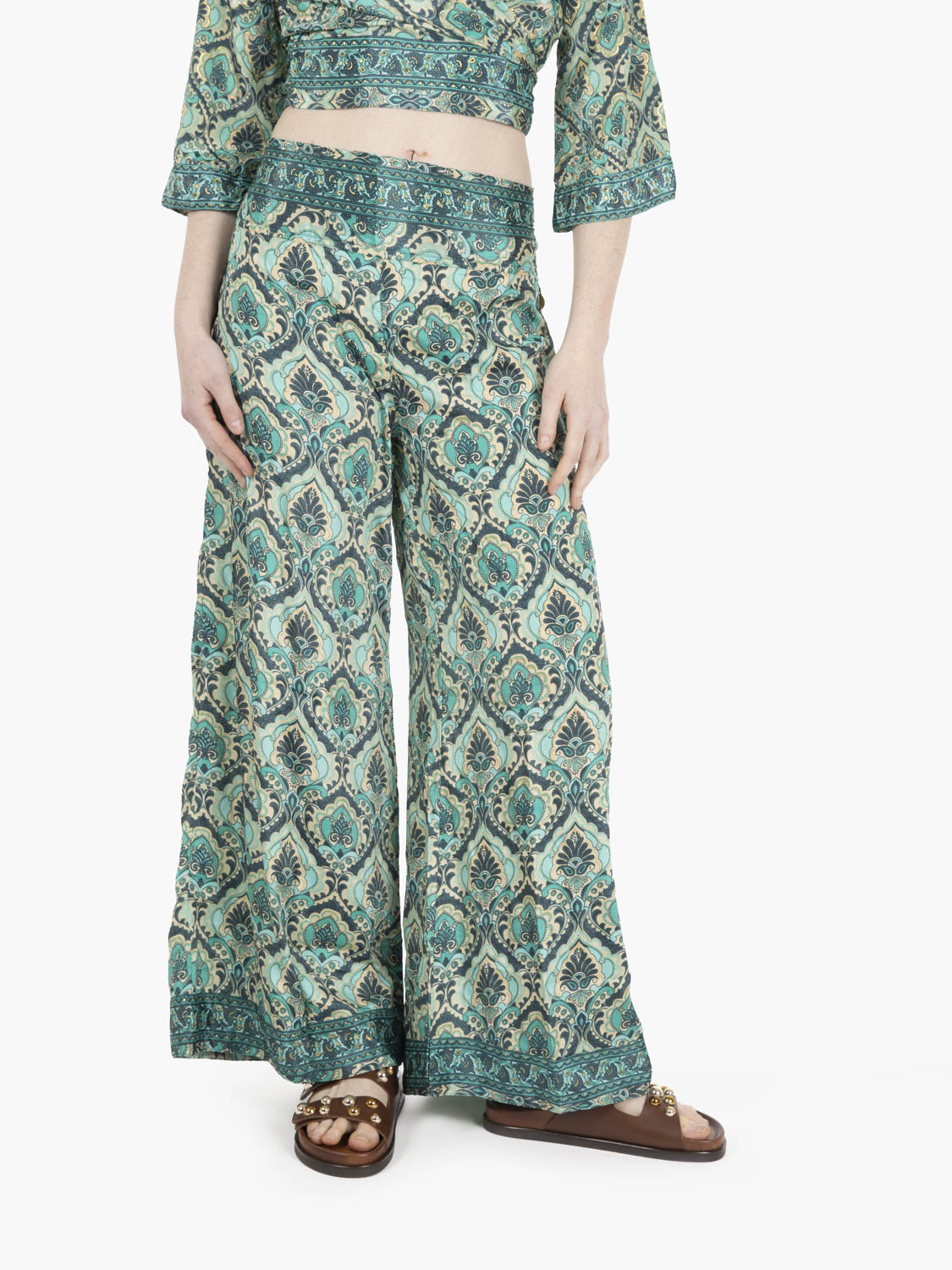 Green patterned silk trousers