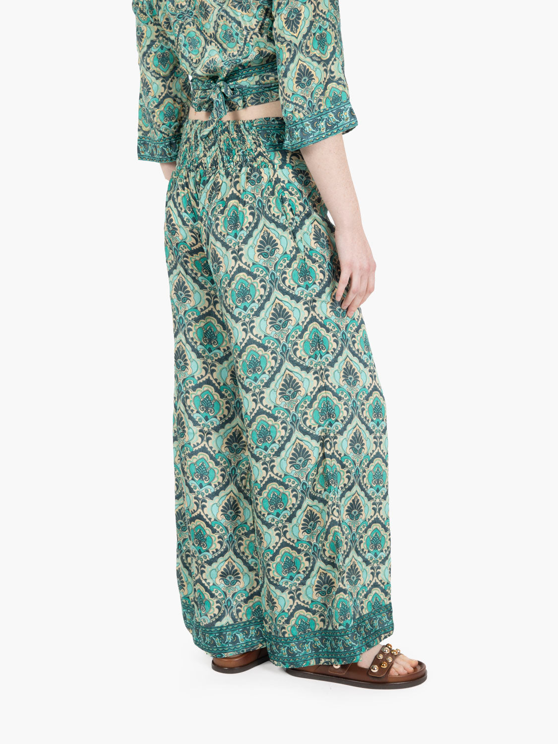 Green patterned silk trousers