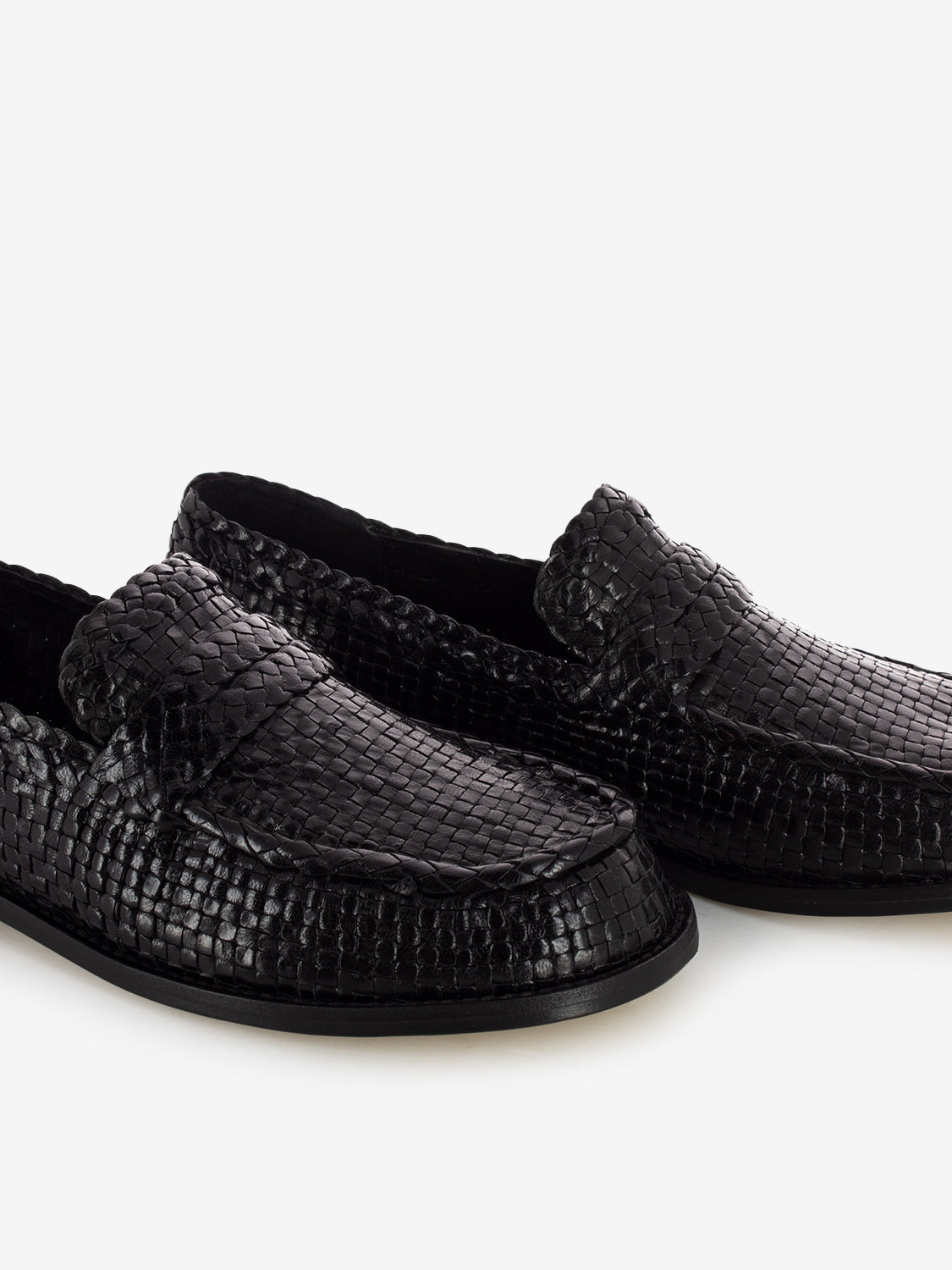 Black woven moccasins
