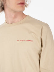 POP TRADING COMPANY - Logo longsleeve t-shirt white pepper / rio red