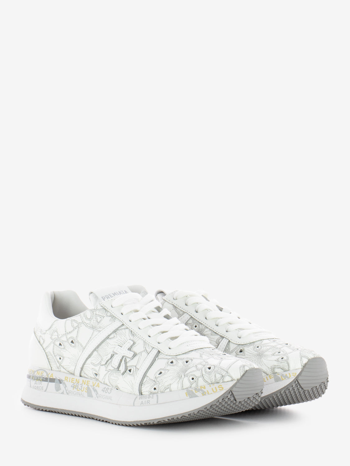 Conny white sneakers